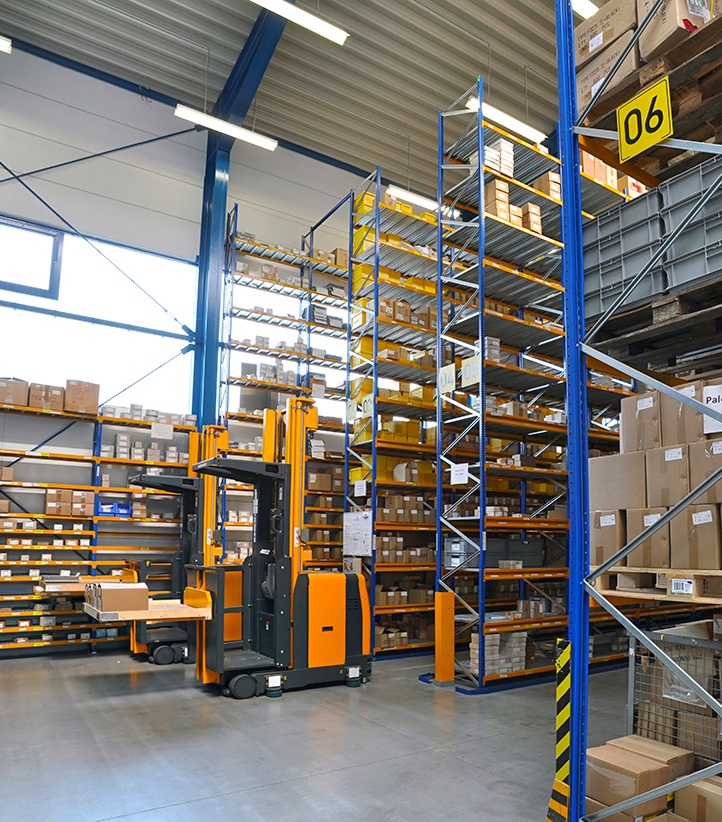 service-logistics-6-720 Forklift moving boxes in warehouse — service logistics